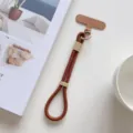 Corto cordón trenzado para teléfono con lengüeta, elegante correa de muñeca para llaves y dijes. - Café Oscuro Con Parche