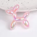 Close-up detail of iridescent pink acrylic balloon dog pendant charm for DIY jewelry making. - Jelly Pink