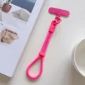 Correa de muñeca rosa para teléfono con lengüeta vista detallada para transporte seguro. - Rojo Rosa Con Parche
