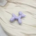Close-up pastel purple acrylic balloon dog pendant charm for DIY crafts and phone case accessory - Light Purple