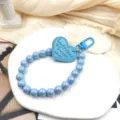 Candy color blue bead bracelet keychain with love heart pendant for stylish mobile phone cases - Light Blue