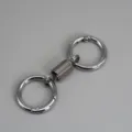 Porte-clés anneau ressort en métal, double mousqueton créatif pour clés et sacs en argent. - Aiguille en argent