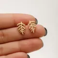Minimalist gold stainless steel leaf stud earrings, delicate plant design, versatile jewelry. - 652 Gold (Plant Leaf)