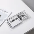 Set de papelería con tema musical con estuche transparente cuaderno lápices y borradores. - Piano Blanco