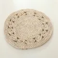 Round braided corn husk placemat detail showing natural texture and woven pattern craftsmanship. - 38 cm E-Pattern