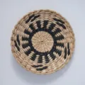 Handwoven straw decorative wall hanging plate, natural black geometric pattern for home decor. - 20cm Black Stylized Floral Vertical Pattern
