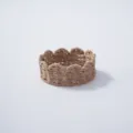 Handmade woven water hyacinth plant pot cover crown shape rustic home decor detail view - Style 3