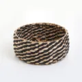 Woven storage basket detail, black and natural straw texture, desktop organizer for cosmetics and keys. - Black Striped Straw Basket