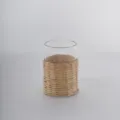 Clear glass vase with hand-woven rattan protective sleeve detail shot, ideal for home decor. - Fully Woven Toothbrush Cups (7x11 cm)
