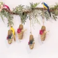 Handmade straw woven parrot toy and hanging home decoration made of natural cattail grass. - Cattail Weave