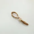 Handwoven straw napkin ring with geometric wooden bead and tassel detail for table decor - Natural Water Hyacinth Napkin Ring with Wood Beads