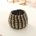 Handmade woven seagrass plant pot cover, natural straw storage basket detail view. - Thatch Pot