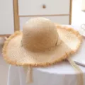 Summer straw sun hat with lace ribbons and fringe trim, ideal for beach and outdoor travel. - One Size / Raw Edge 1
