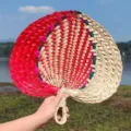 Handmade palm leaf fan traditional woven straw fan for summer cooling and home decor. - Round Handle Palm Leaf Fan - Red Full Pattern