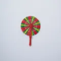 Detailed view of handmade woven straw fan texture and colorful handle craftsmanship. - Style 6