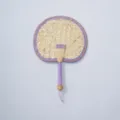 Handmade woven straw fan detail, natural plant fiber summer cooling fan with purple edge. - Style 14