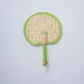 Hand-woven natural straw fan with green fabric border for summer cooling and home decor. - Style 13