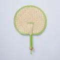 Handmade woven straw fan detail, natural material circular fan with green fabric border. - Style 26
