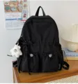 Schwarzer Plissee Rucksack lässiger Tagesrucksack mit Plüsch Stern Anhänger und Fronttaschen Damen - L / Schwarz
