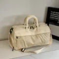 Large capacity beige gym travel bag, lightweight portable duffel for sports and short trips. - Off White