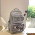 Light blue canvas student school backpack with transparent pockets and cute badge charms for girls. - Blue Backpack with Charm
