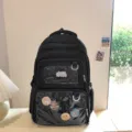 Schwarzer Canvas Rucksack mit großen Fronttaschen und durchsichtigen Fächern für Studenten. - Schwarzer Rucksack (ohne Anhänger)