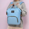 Sac à dos à langer bleu léger et multifonctionnel de grande capacité pour mères. - Bleu clair
