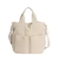 Beige Freizeittasche aus Nylon für Damen, große Tragetasche mit Schultergurt. - Gebrochenes Weiß