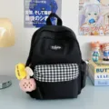 Black mini backpack with black and white plaid front pocket and cute pendants sku. - Black with Pendant