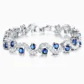 Brazalete plateado ondulado con piedras redondas azules brillantes y cristales de circonita. - Azul Zafiro