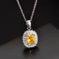 Atemberaubende gelbe Zirkon Anhänger Halskette mit funkelndem klaren Stein Halo Detail. - Halskette / Goldgelbe Zirkonia Halskette