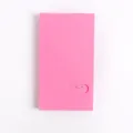 Pink card holder detail view, cute emoticon window design, neat and compact storage solution for cards. - Red