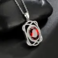 Elegante collar con colgante de plata y gema roja brillante con pavé de circonitas. - Collar Rojo Granate (Acero Inoxidable)