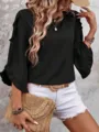 Black ruffle 3/4 sleeve blouse detail, featuring round neck and elegant casual design for women. - S / Black