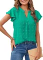 Green chiffon blouse detail showing V-neck, ruffle sleeves, and cute pom pom texture. - Cyan