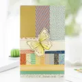 DIY decorative sticker book with vintage pattern papers and golden butterfly for journal craft. - Default
