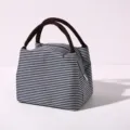 Blue and white striped insulated lunch bag with durable handles and secure zipper closure. - Small Black Striped