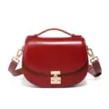 Elegant red leather saddle bag for women with top handle and crossbody strap. Fashionable design. - 19*6*15CM / Red