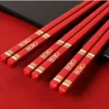 Red Chinese wedding chopsticks set featuring elegant gold double happiness pattern detail. - 24cm / "Fang Xi" Square Single Pair Loose Packing