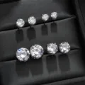 Klassische vier Krappen runde Zirkonia Ohrstecker Set, elegantes minimalistisches Design. - Vier-Klauen Stil (E463) / 7mm / Weiß