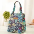 Insulated lunch bag for office and school, stylish leaf print portable bento cooler bag variant. - Night Summer