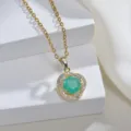 Goldkette mit gruenem Zirkonia Anhaenger und Pave Heiligenschein, elegante Modevariante. - Smaragdgrün