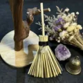 Close-up of the miniature witch broom hanging ornament with crystal pendant and natural fibers. - About 15cm / Broom with Citrine