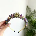 Crystal crown headband detail featuring colorful quartz stones and a gold bee centerpiece. - Multicolor With Gold Bee
