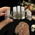 Gothic crystal crown headband with raw pink quartz, metal butterfly and skull details for photo. - Pink Crystal + Antique Bronze Crow & Butterfly