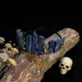 Close-up detail showing the gothic crystal crown headband with blue stones and metal skull charms. - Lapis Lazuli + Antique Bronze Crow Skull