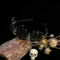 Gothic black crystal crown headband detail, featuring metal wire wrap and skull charm props. - Obsidian + Antique Bronze Crow Skull