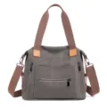 Borsa a tracolla classica in tela grigia da donna, grande borsa tote con cinturini e tasche. - Grigio