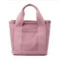 Pink canvas tote bag, casual daily handbag with sturdy handles and front pocket for women. - Pink
