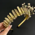Detailed view of handmade crystal crown headband with gold wire and dried flowers for women. - Gold